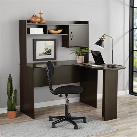 Walmart l shaped desk - All too often, though, our desks are still mere wooden slabs designed for use as 19th-century writing workstations. Bring your life into the 21st century with this versatile L-shaped corner desk. Standing 29.5 inches high, our home office desk measures 72 x 19 inches along its long side and 53 x 19 along with the other.